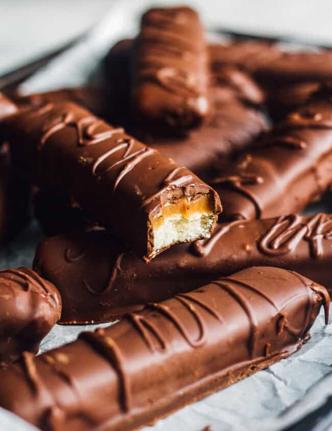 homemade twix bars on parchment paper