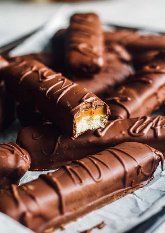 homemade twix bars on parchment paper