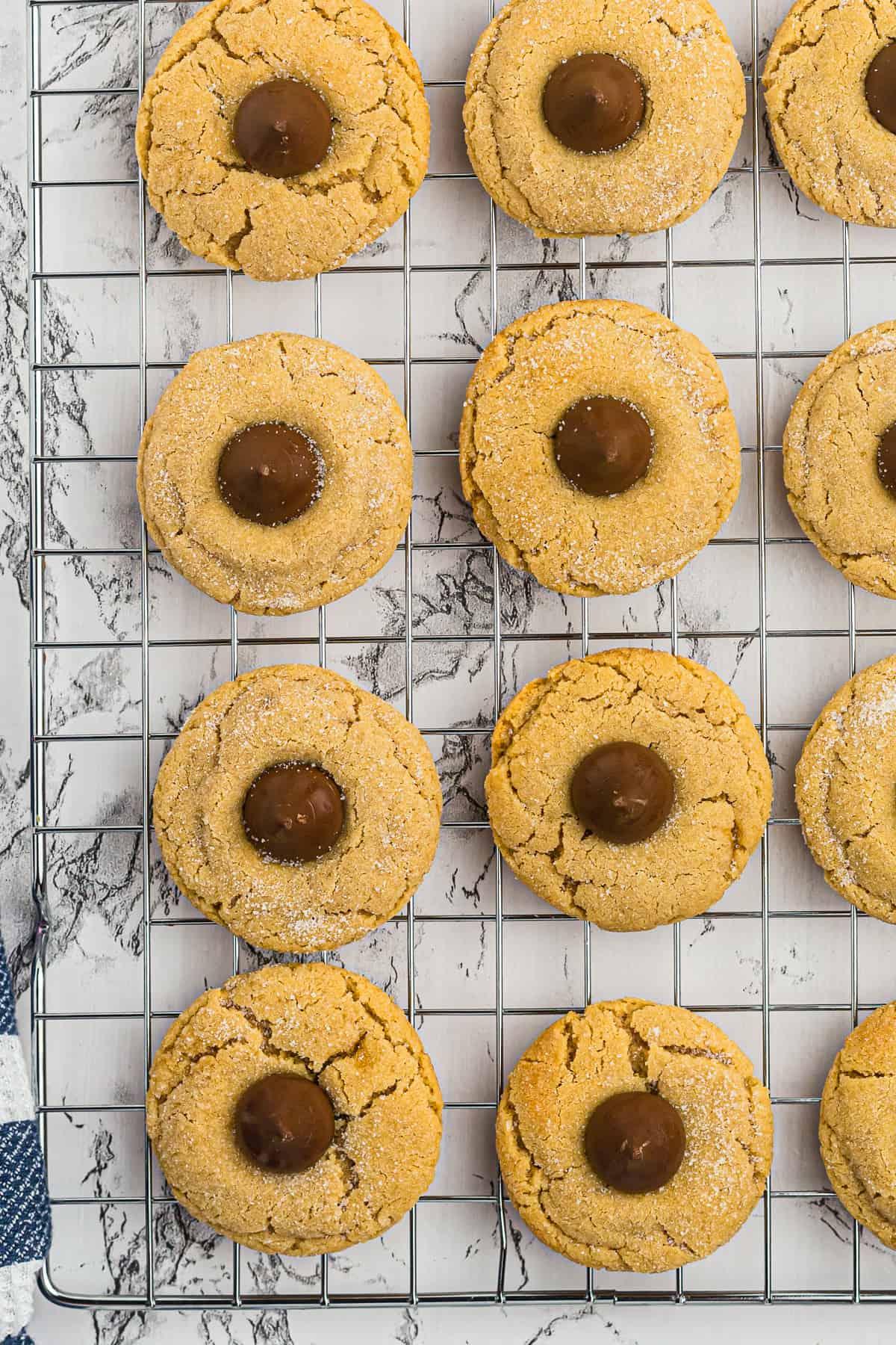 peanut butter kiss cookies on cooling rack