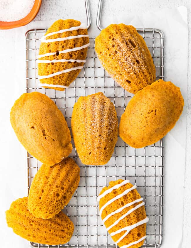 up close pumpkin madeleines on cooling rack