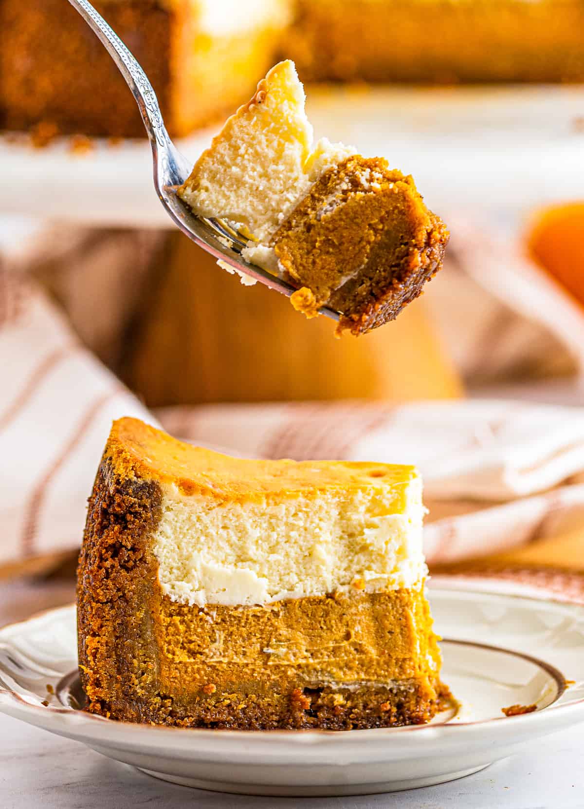 bite of pumpkin pie cheesecake