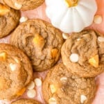 white chocolate pumpkin spice cookies on pink table