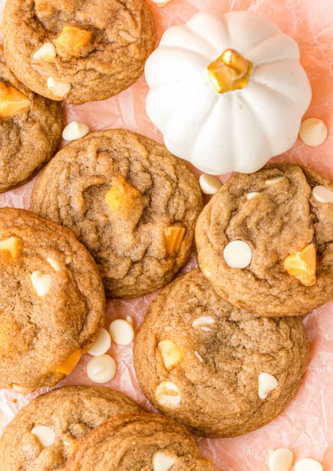 white chocolate pumpkin spice cookies on pink table