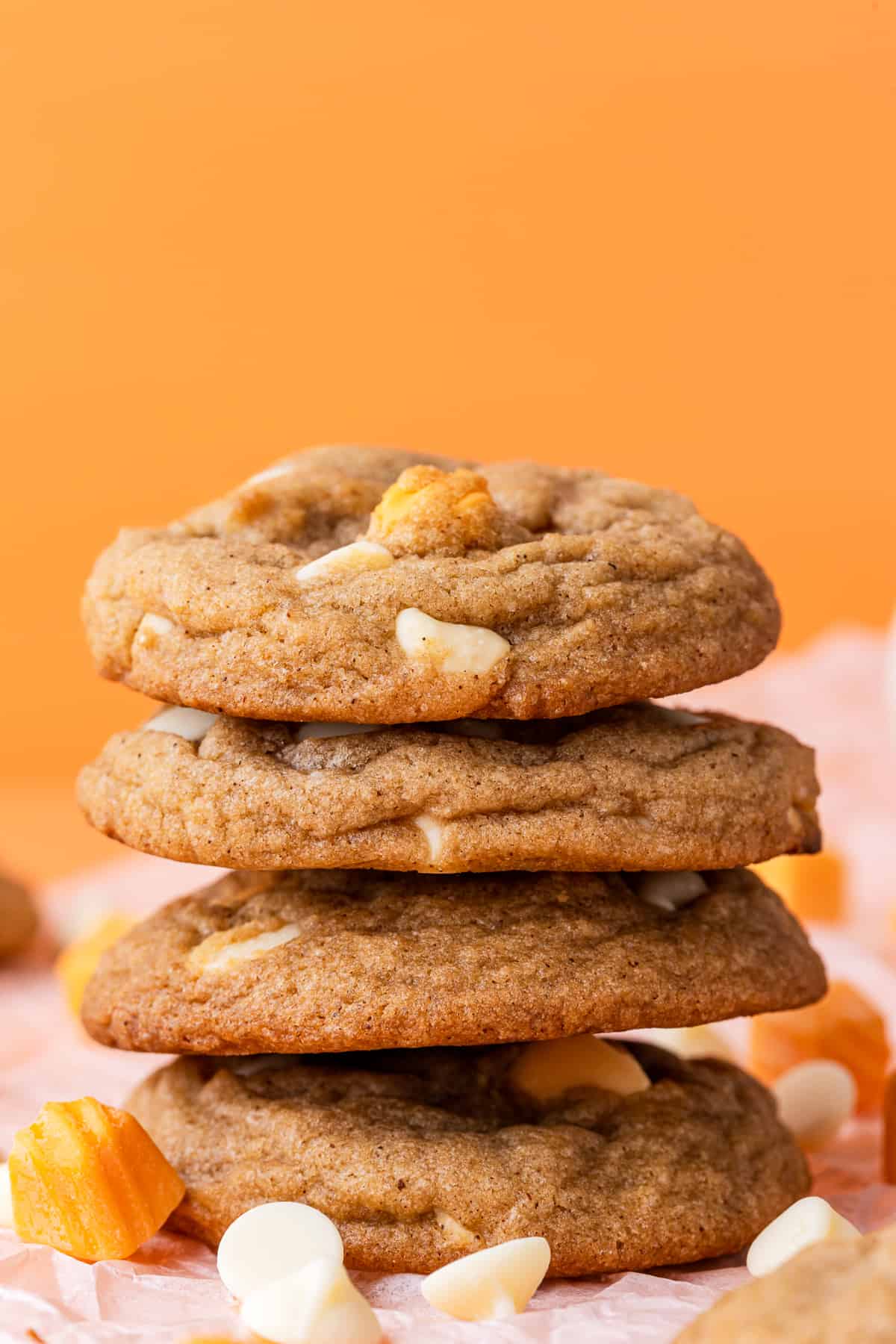 stacked pumpkin spice cookies with white chocolate chips