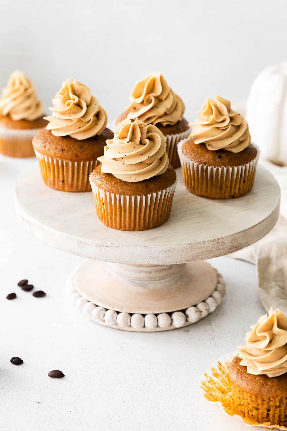pumpkin spice latte cupcakes on cake stand