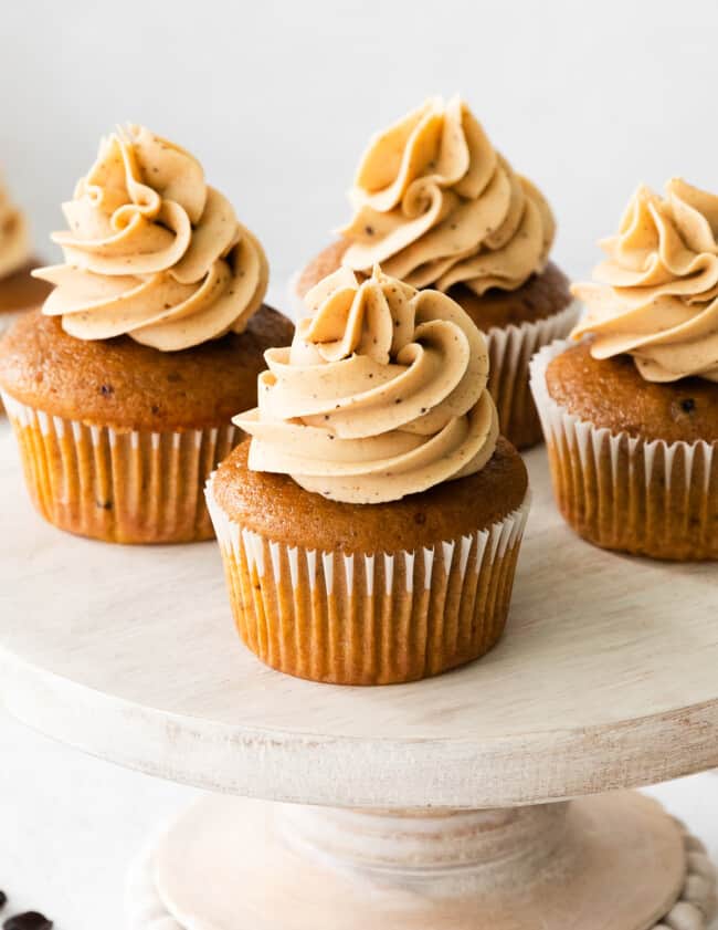 up close pumpkin spice latte cupcakes on cake stand