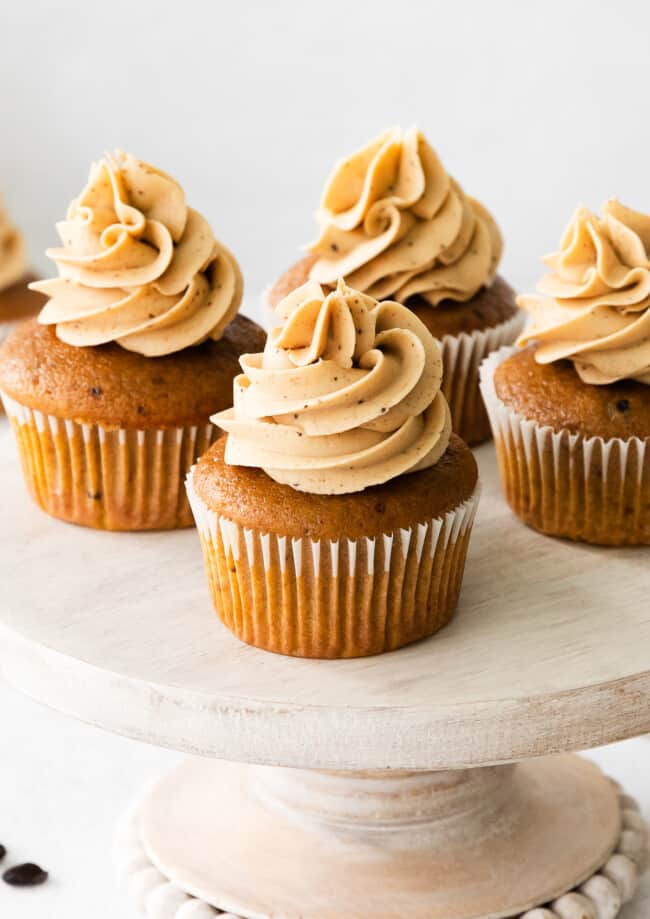 up close pumpkin spice latte cupcakes on cake stand