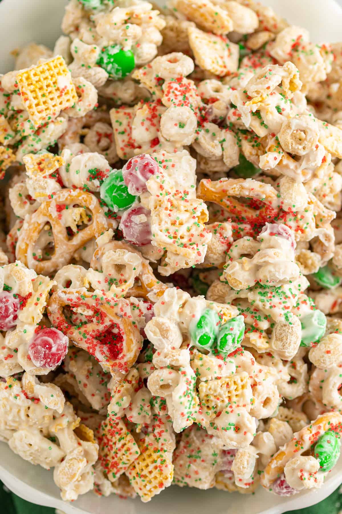 up close christmas chex mix in white bowl