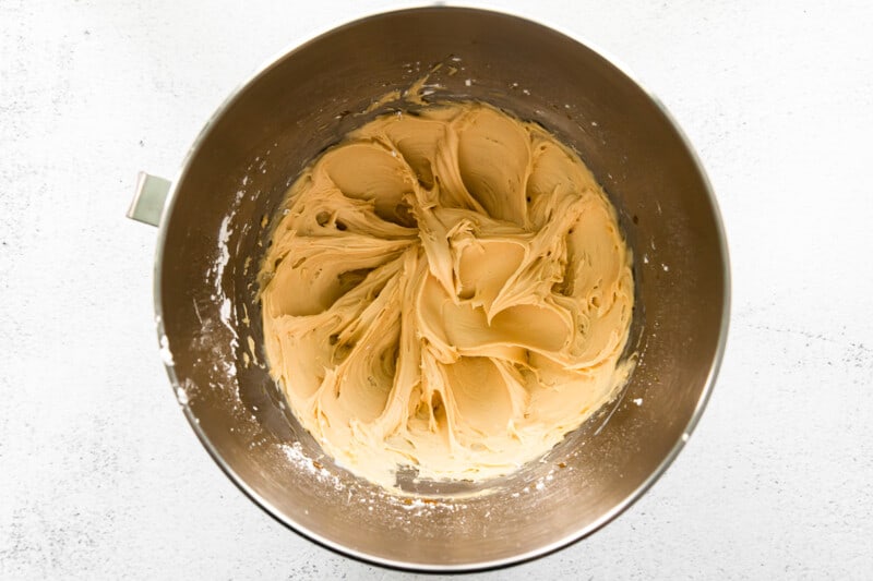 caramel frosting in a metal bowl