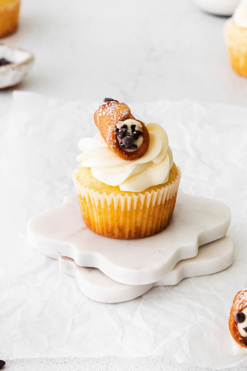 cannoli cupcake on white table