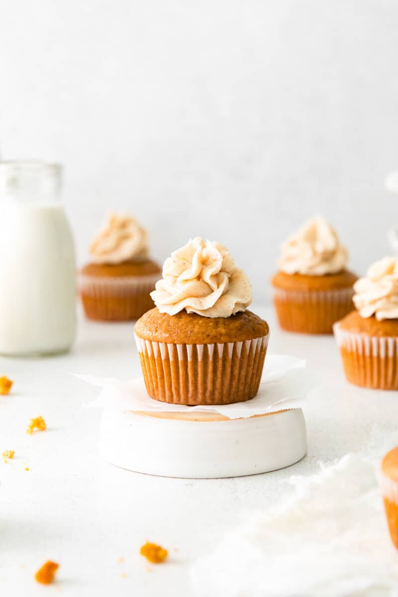 gingerbread cupcakes topped with spiced white chocolate frosting
