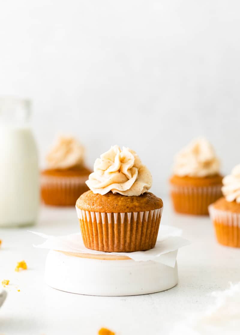 gingerbread cupcakes topped with spiced white chocolate frosting