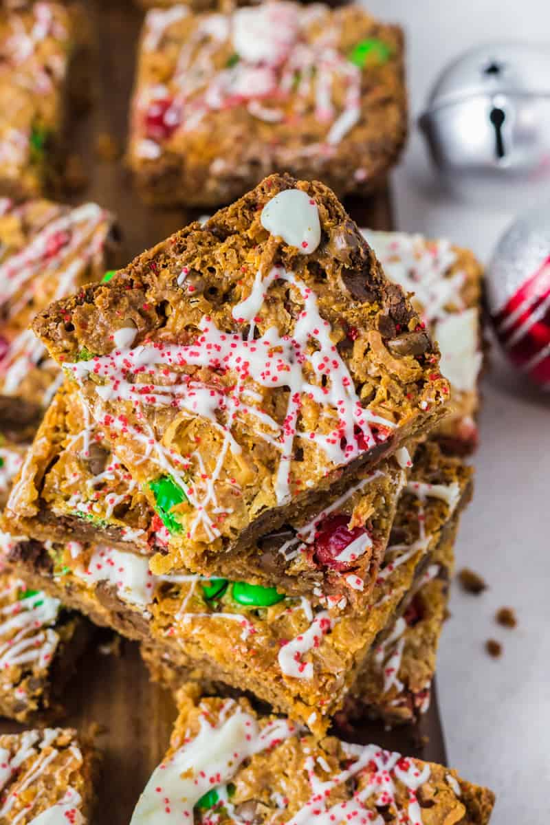 stack of christmas 7 layer magic cookie bars