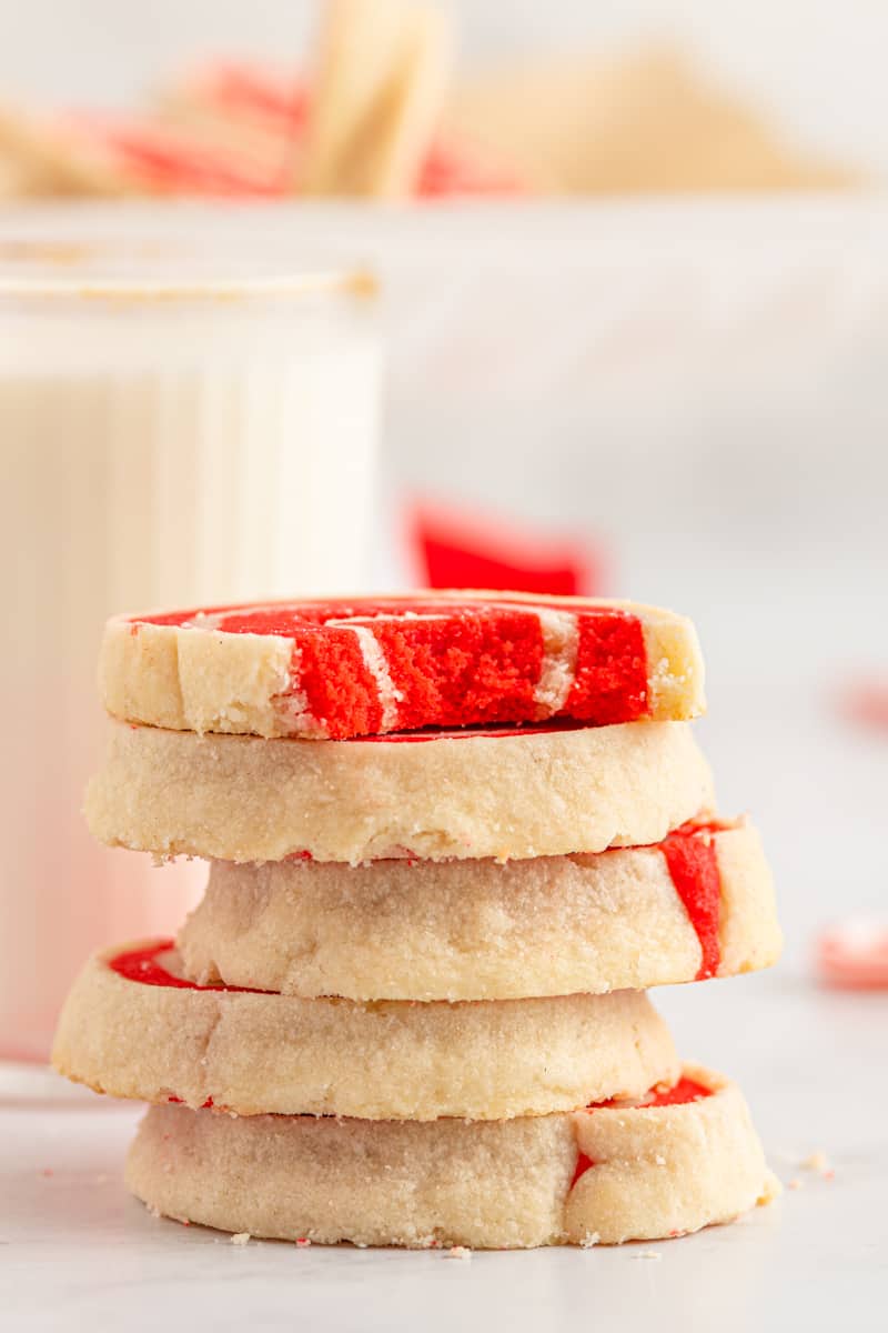 stack of white and red pinwheel cookies
