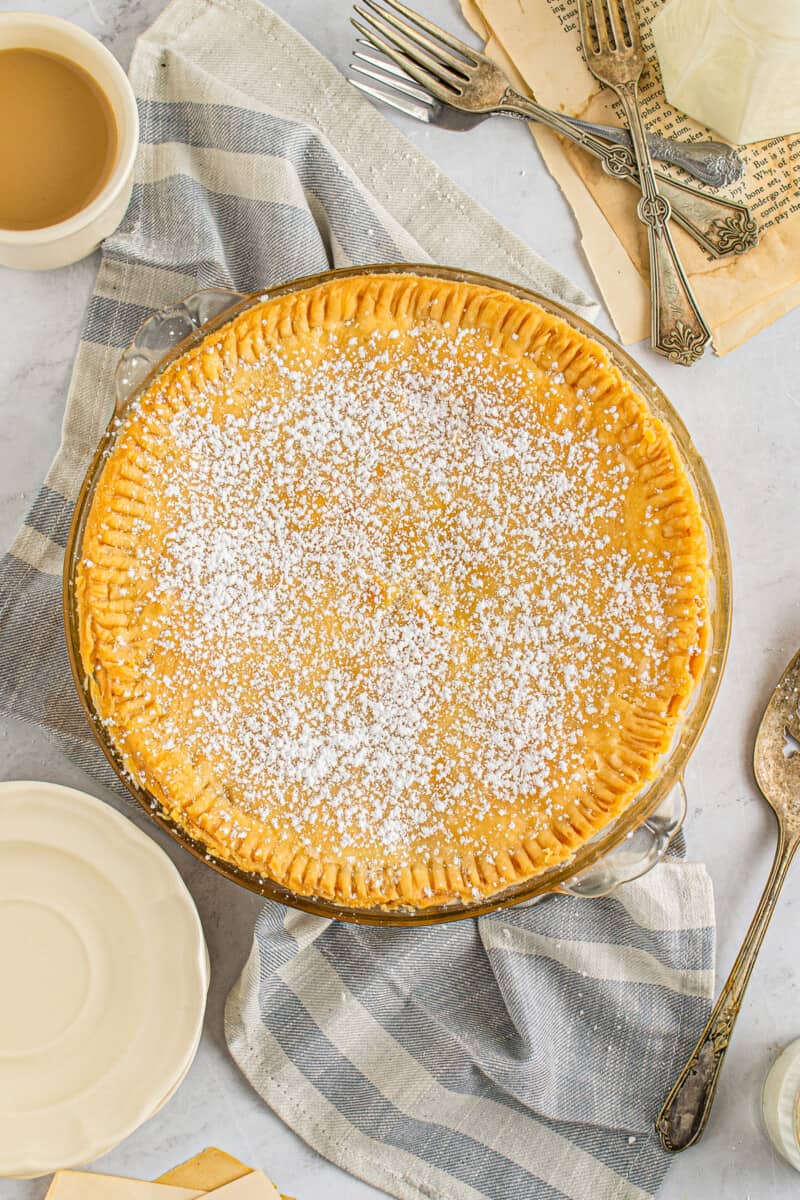buttermilk chess pie topped with powdered sugar