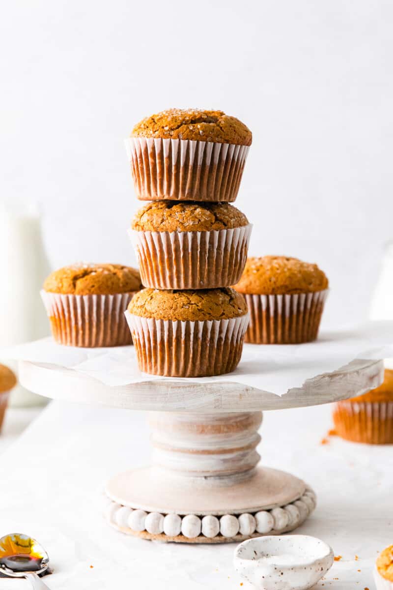 stack of 3 gingerbread muffins on a cake stand