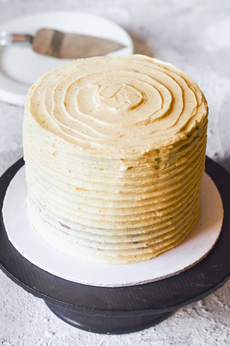 brown butter spice cake on a cake stand