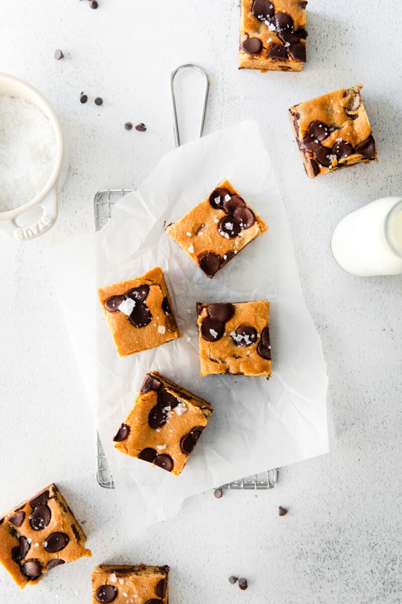 overhead image of chocolate chip cookie bars on parchment paper