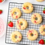 strawberry donuts without glaze on a cooling rack