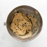 chocolate chip cookie dough in a metal bowl