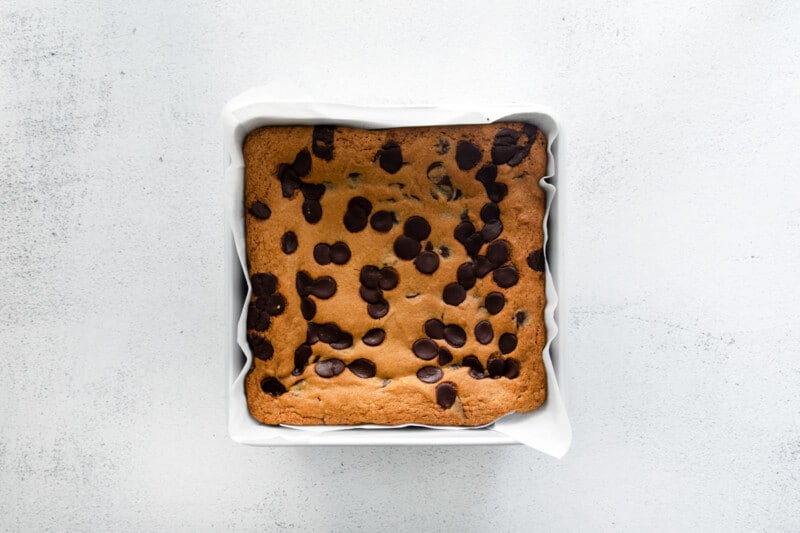 chocolate chip cookie bars in a baking pan after baking