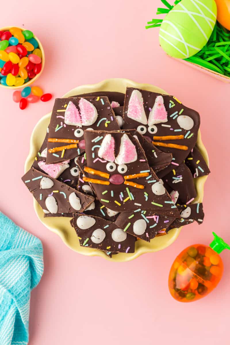 pieces of easter bunny chocolate bark on a yellow plate