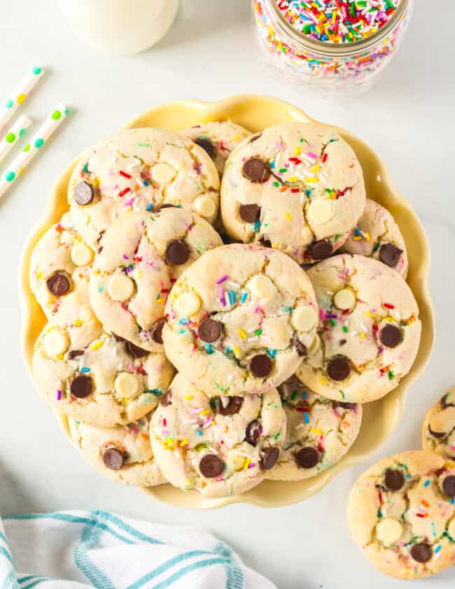 overhead image of cake batter cookies on a yellow plate