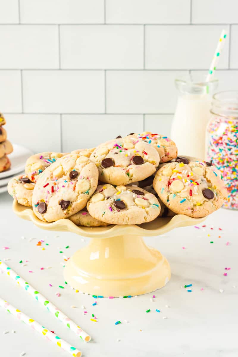 cake batter cookies on a yellow cake stand