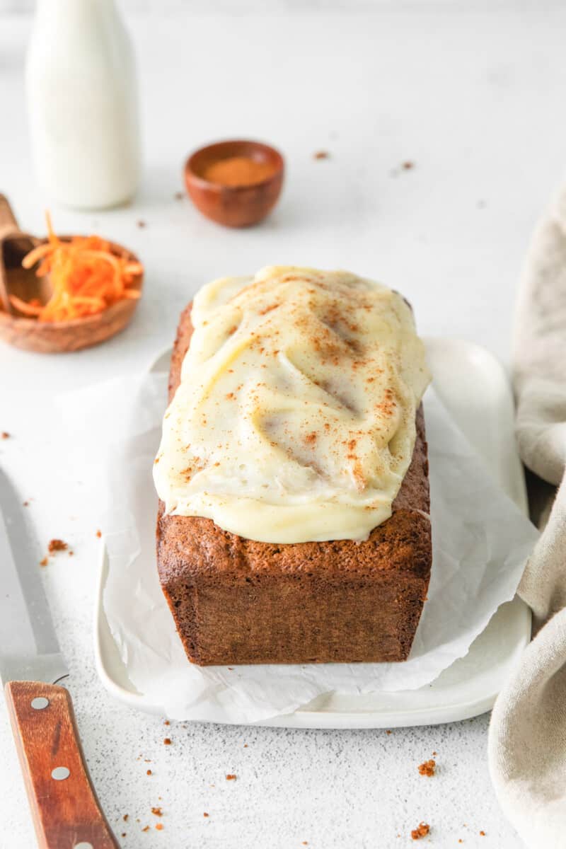 carrot bread topped with cream cheese glaze