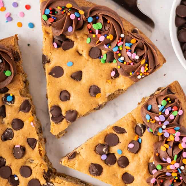 slice of chocolate chip cookie cake on a spatula