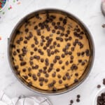 chocolate chip cookie cake in a pan before baking