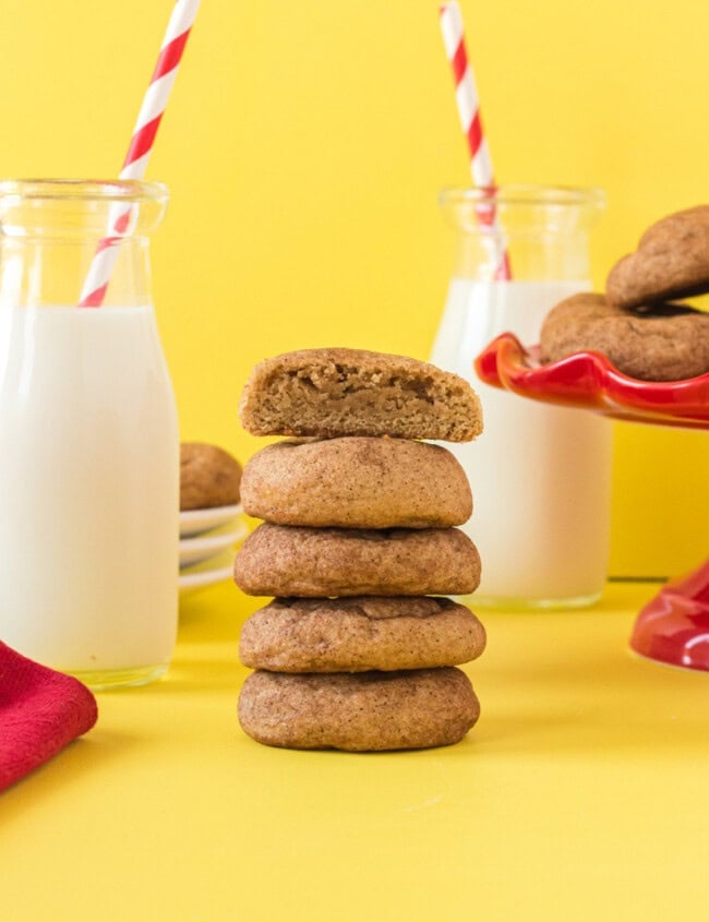 halved churro cookie on top of a stack of 4 cookies.