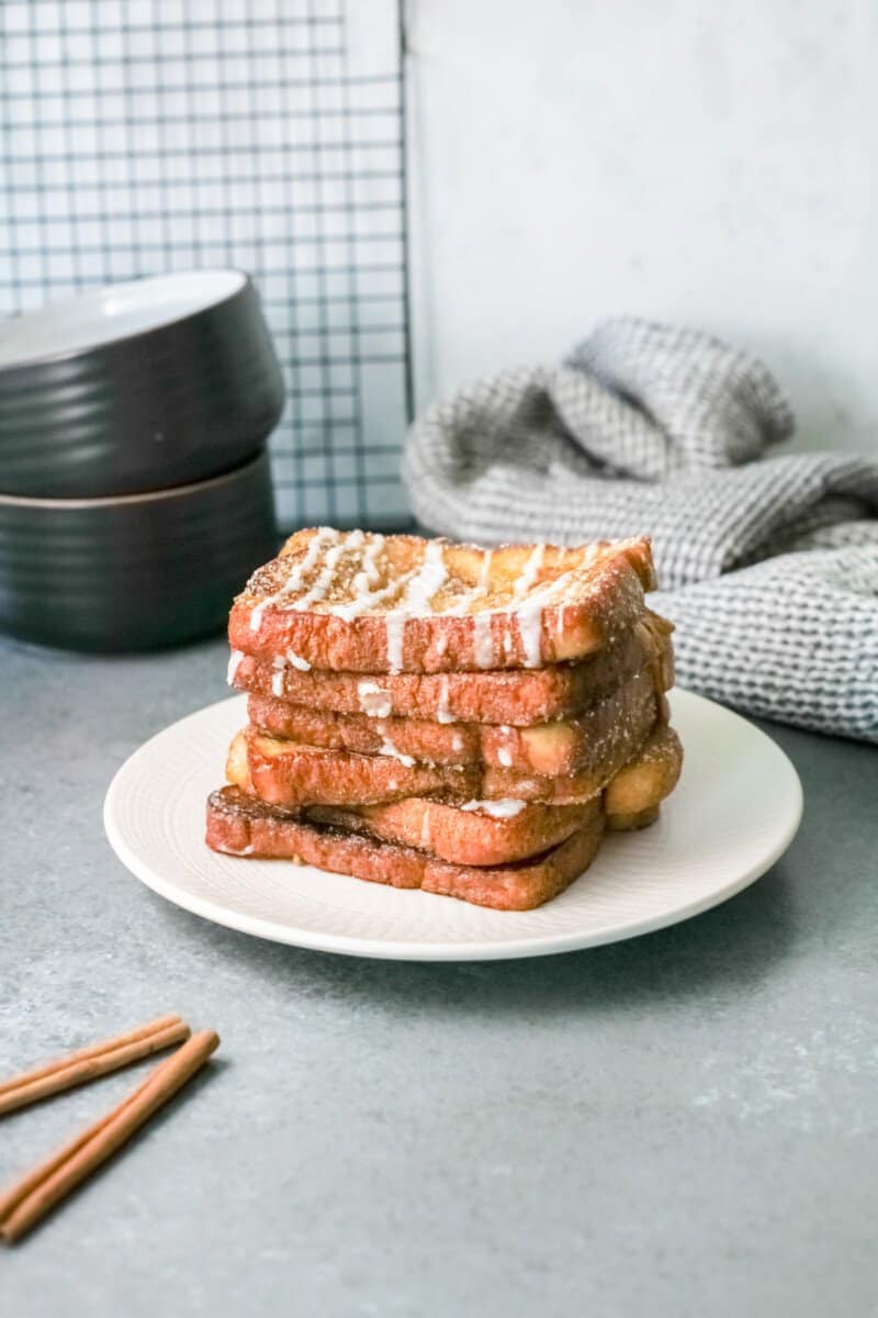 6 stacked slices of churro french toast.