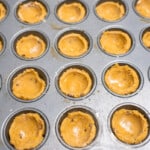 formed easter basket cookie cup dough in a mini muffin tin.