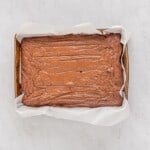 overhead view of baked peppermint brownies in a baking pan.