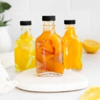 homemade citrus extracts in clear jars