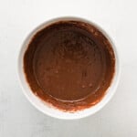 hot chocolate cupcake batter in a white bowl.