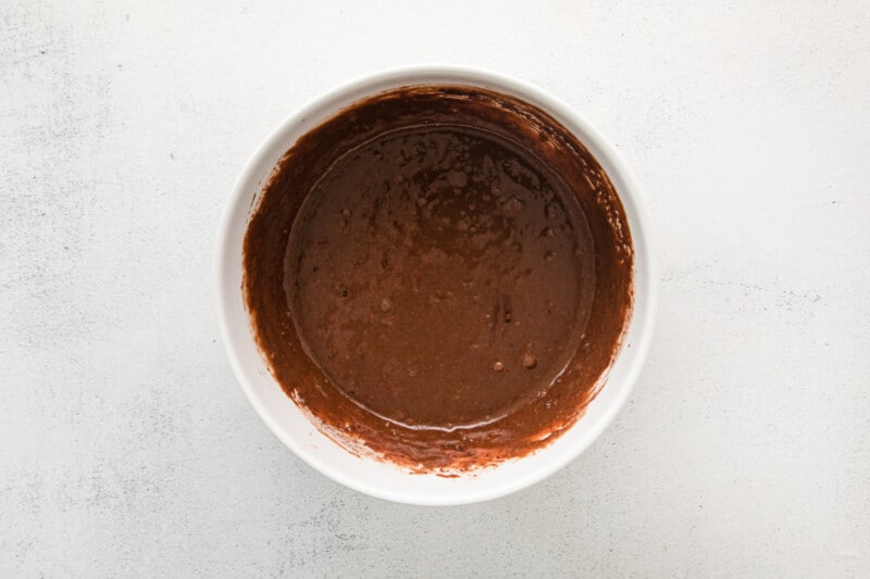 hot chocolate cupcake batter in a white bowl.