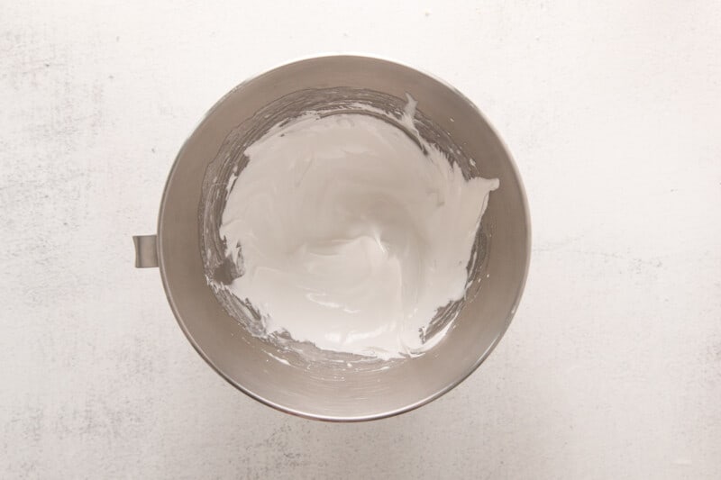 marshmallow meringue frosting in a stainless mixing bowl.