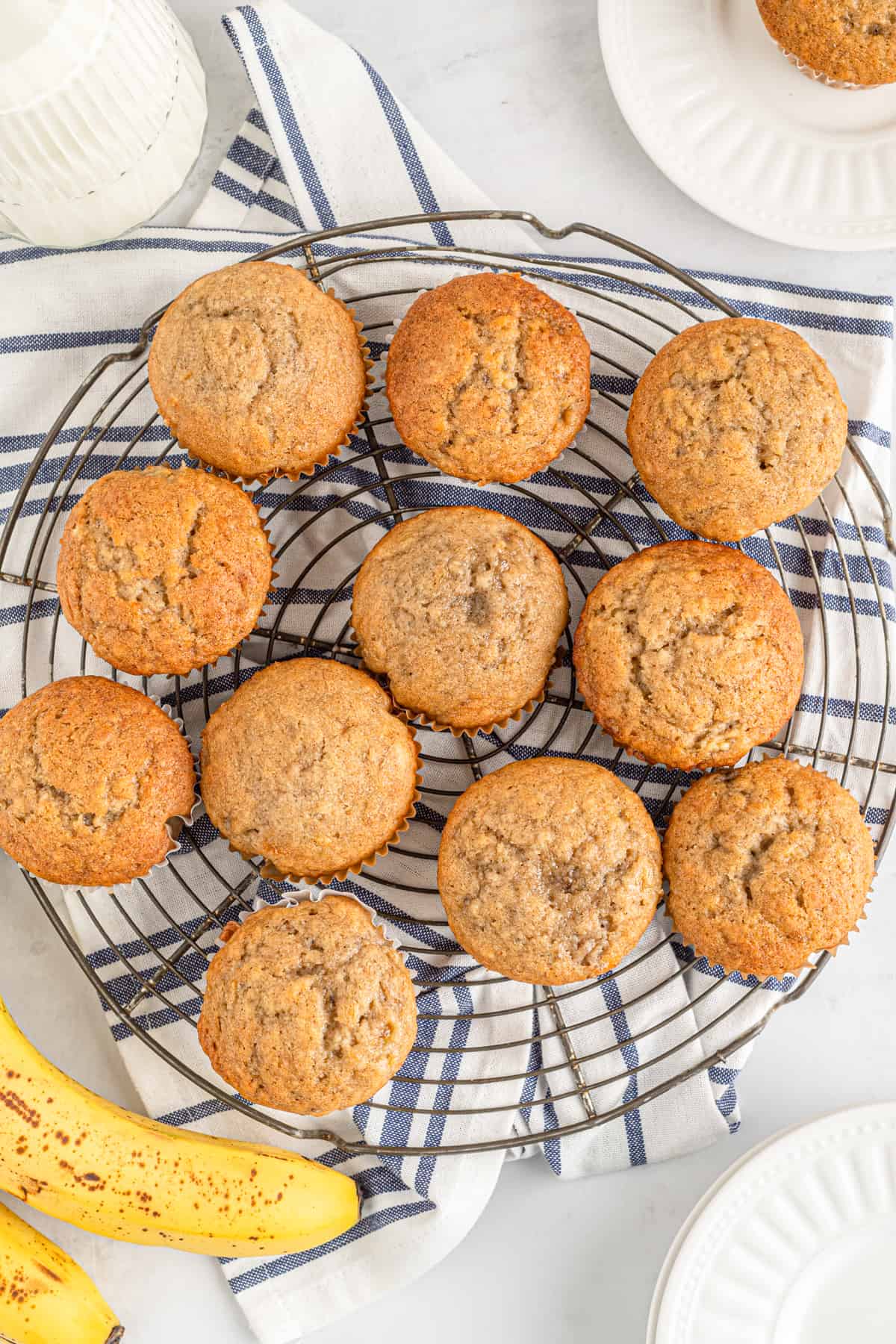 ripe banana muffins on a cooling rack