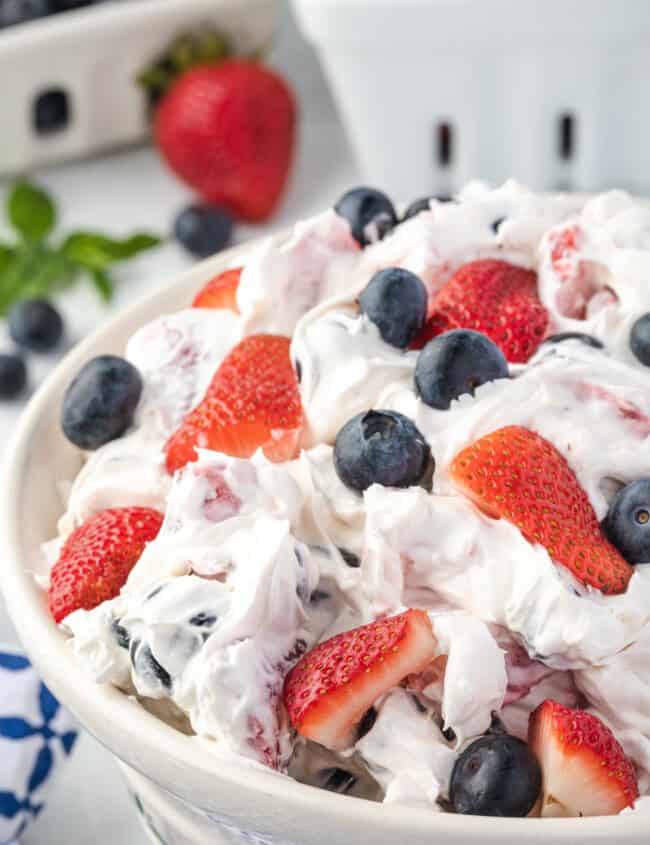 berry cheese cake salad in a large serving bowl