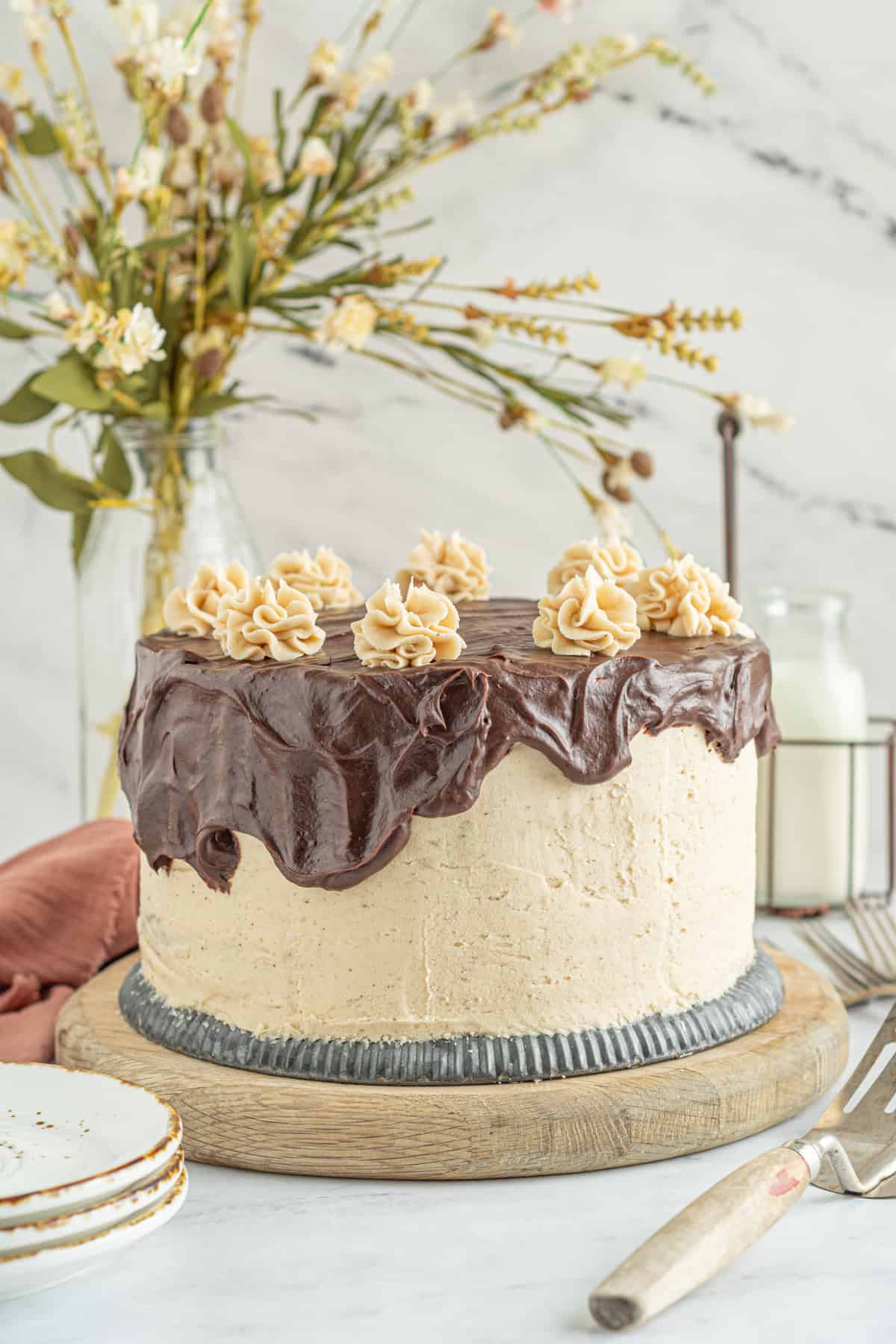 a chocolate cake with peanut butter frosting and chocolate ganache