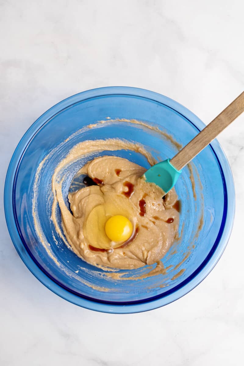 combining wet ingredients in a mixing bowl