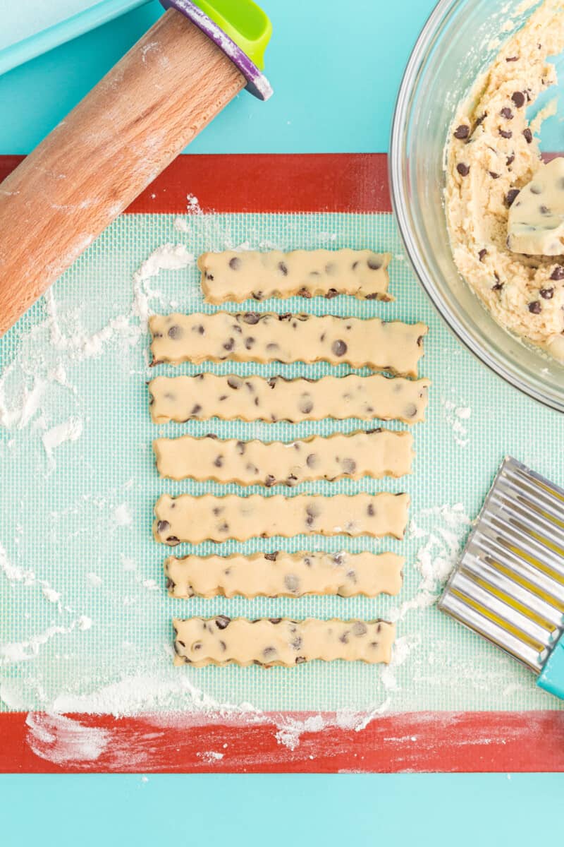 cookie dough strips on a silicone mat