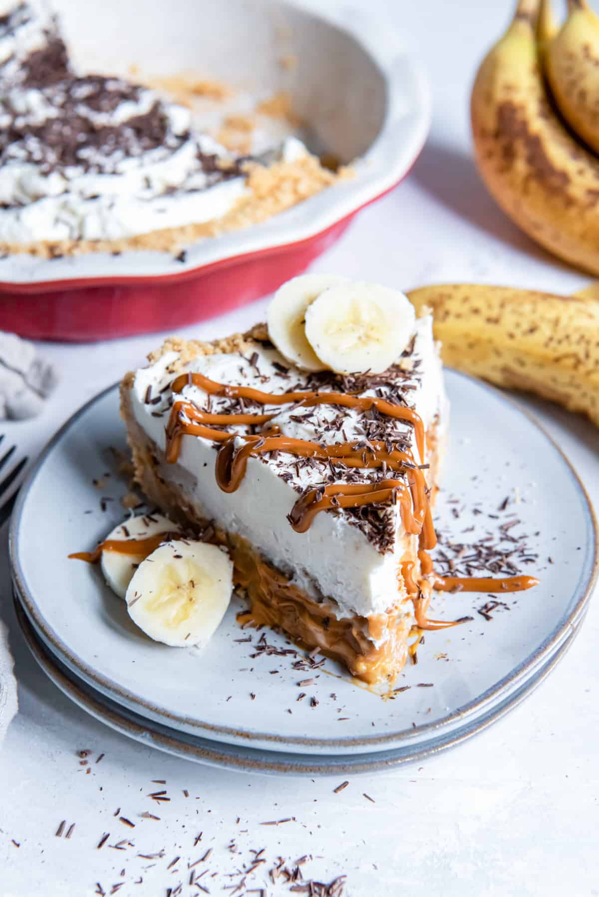 slice of banana toffee pie on a plate