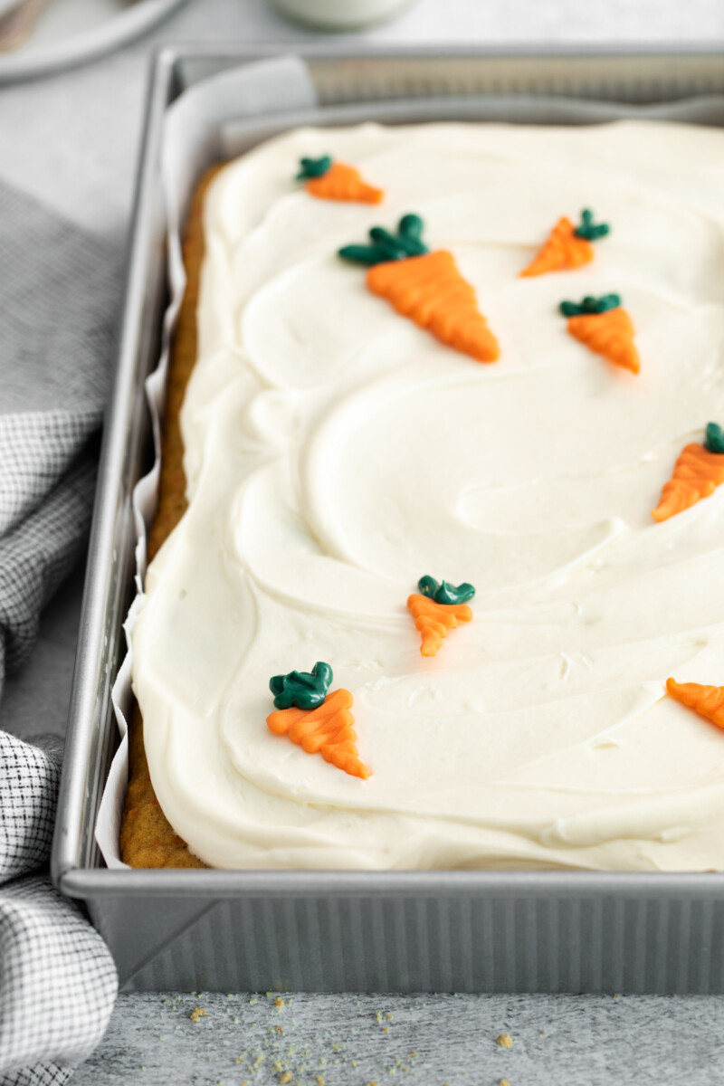 close up view of carrot cake in a 9x13 cake pan.