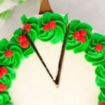 overhead view of christmas wreath cake, with green frosting around the edges