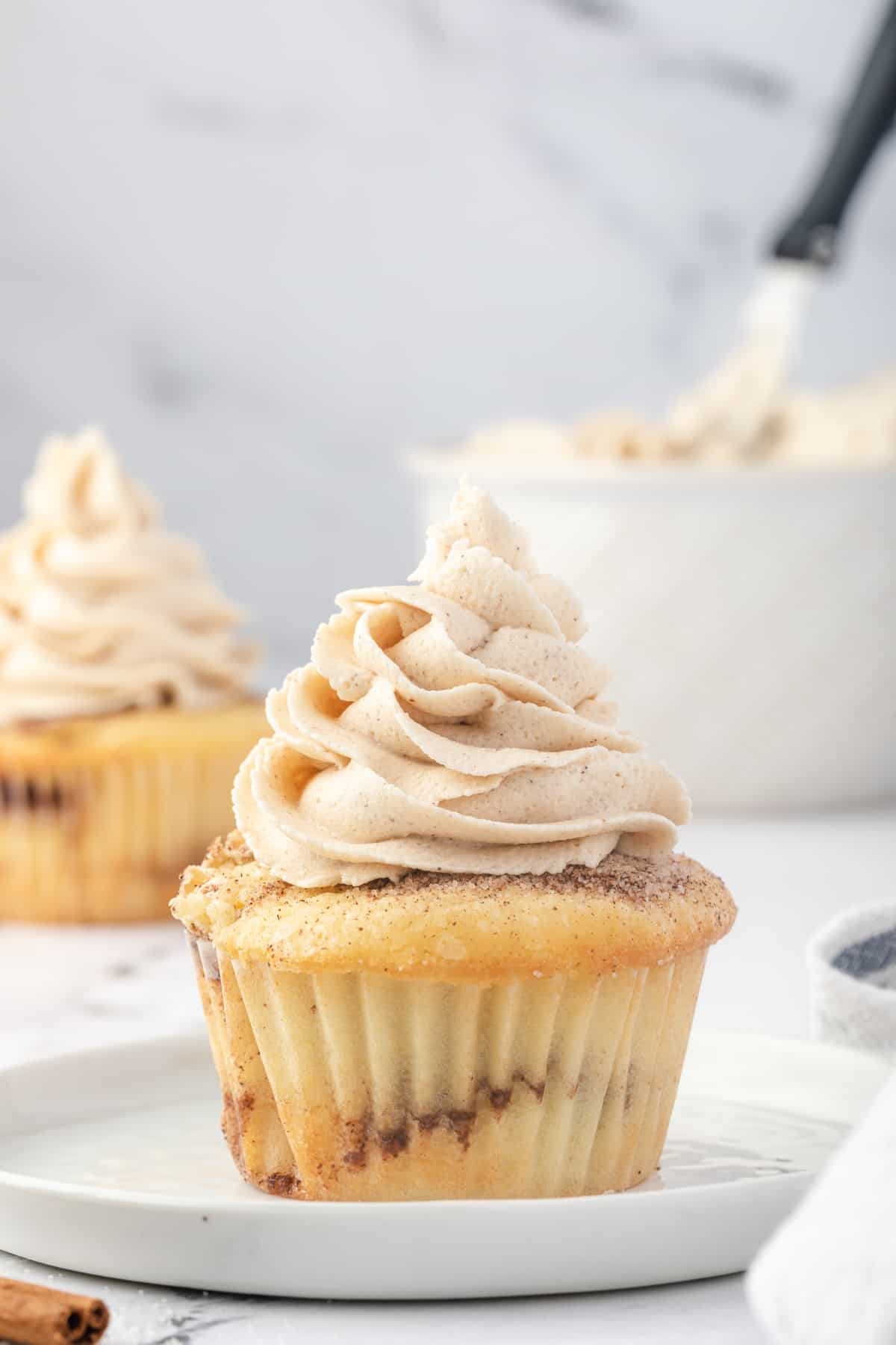 cupcake topped with cinnamon brown sugar frosting