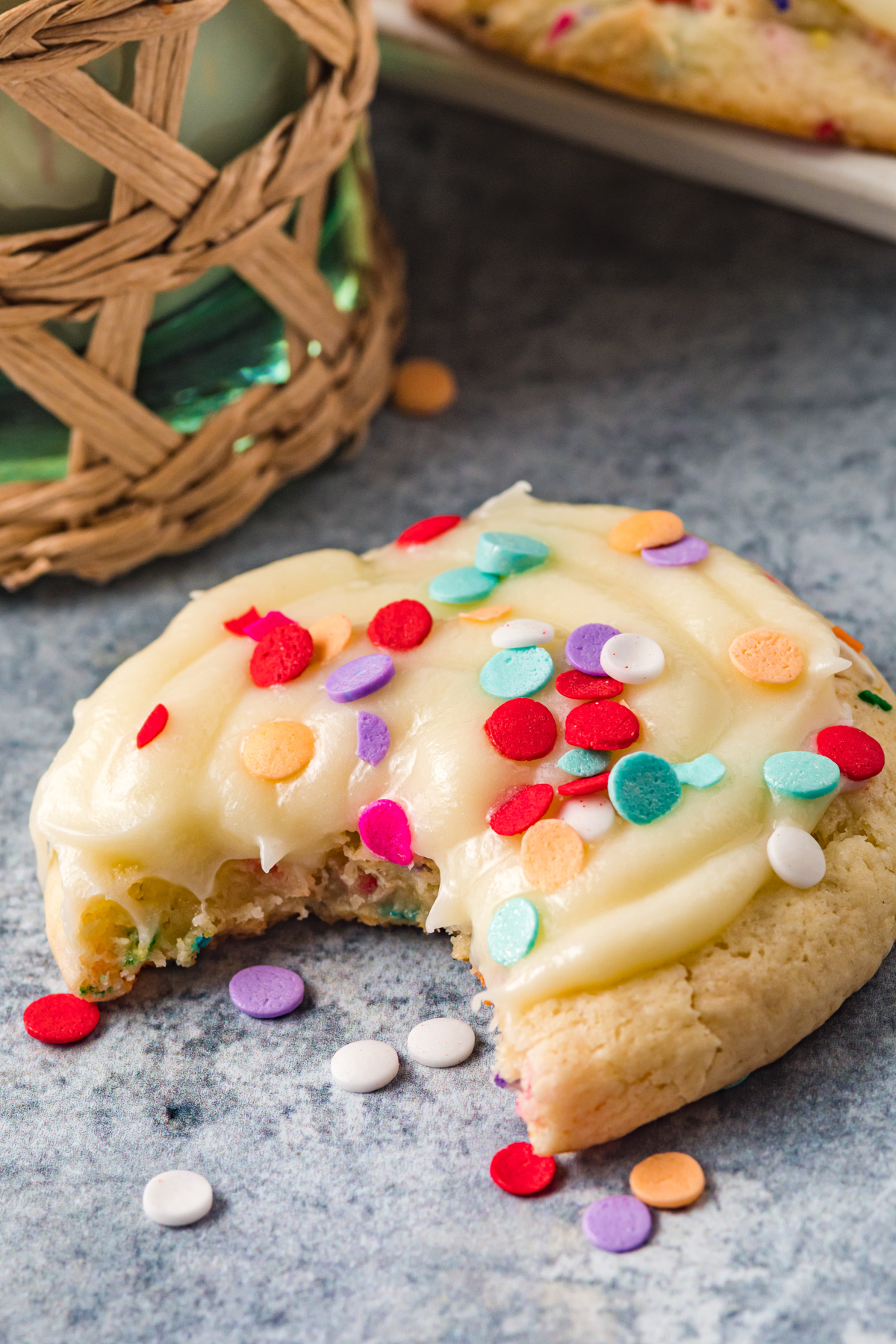 confetti cake cookie with a bite taken out of it