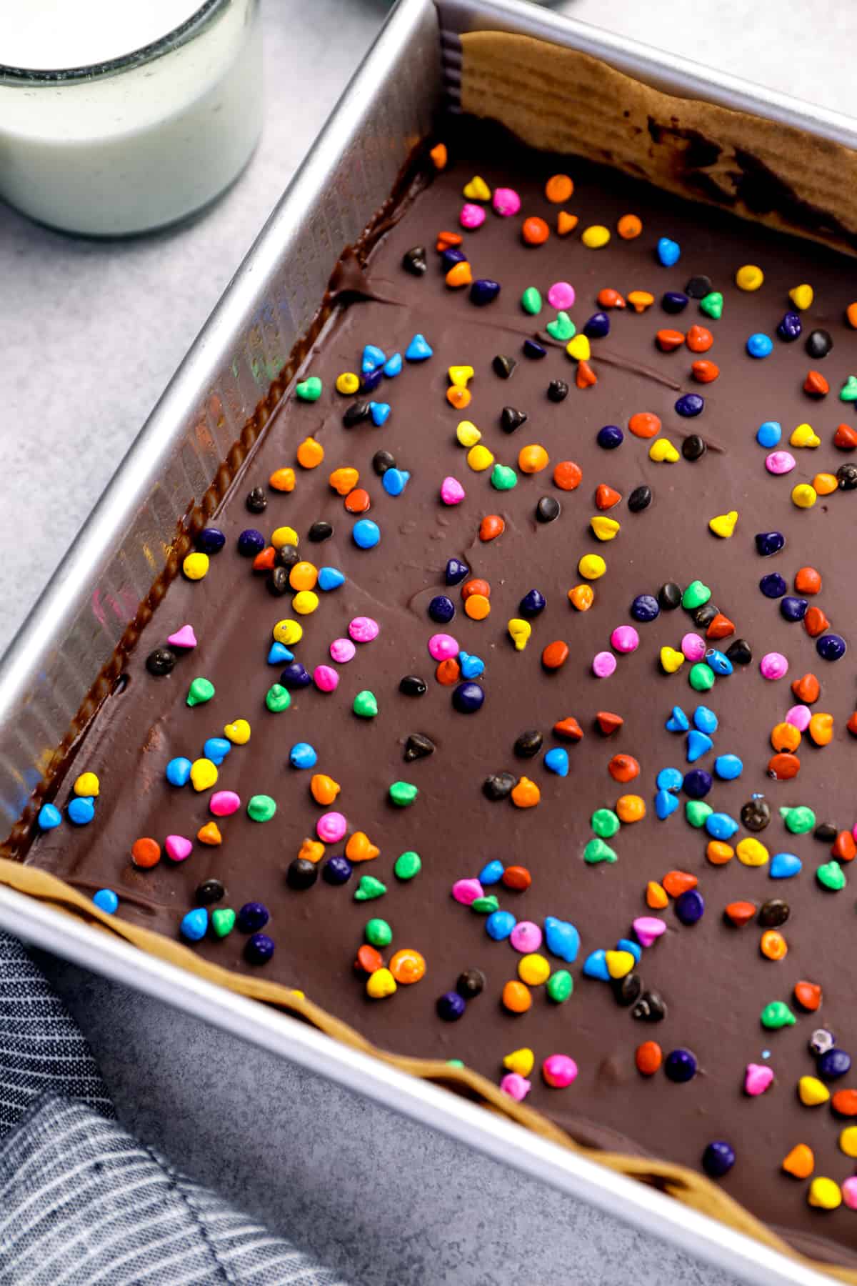cosmic brownies with sprinkles in a brownie tin